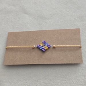 New Handmade Purple and Yellow Beaded Bracelet
